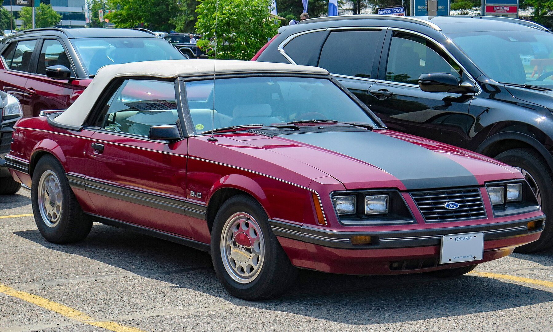 1983 Ford Mustang GLX 5.0 Convertible in Medium Red, front right (Queen Street 2023)