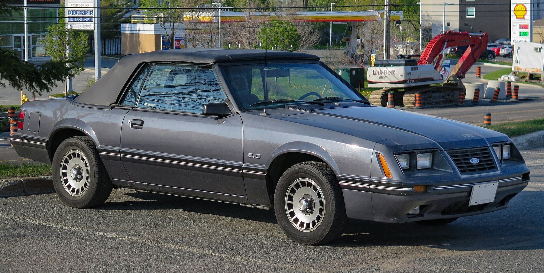 1984 Ford Mustang GT 5.0 Convertible in Dark Charcoal Metallic, Front Right, 05-21-2023
