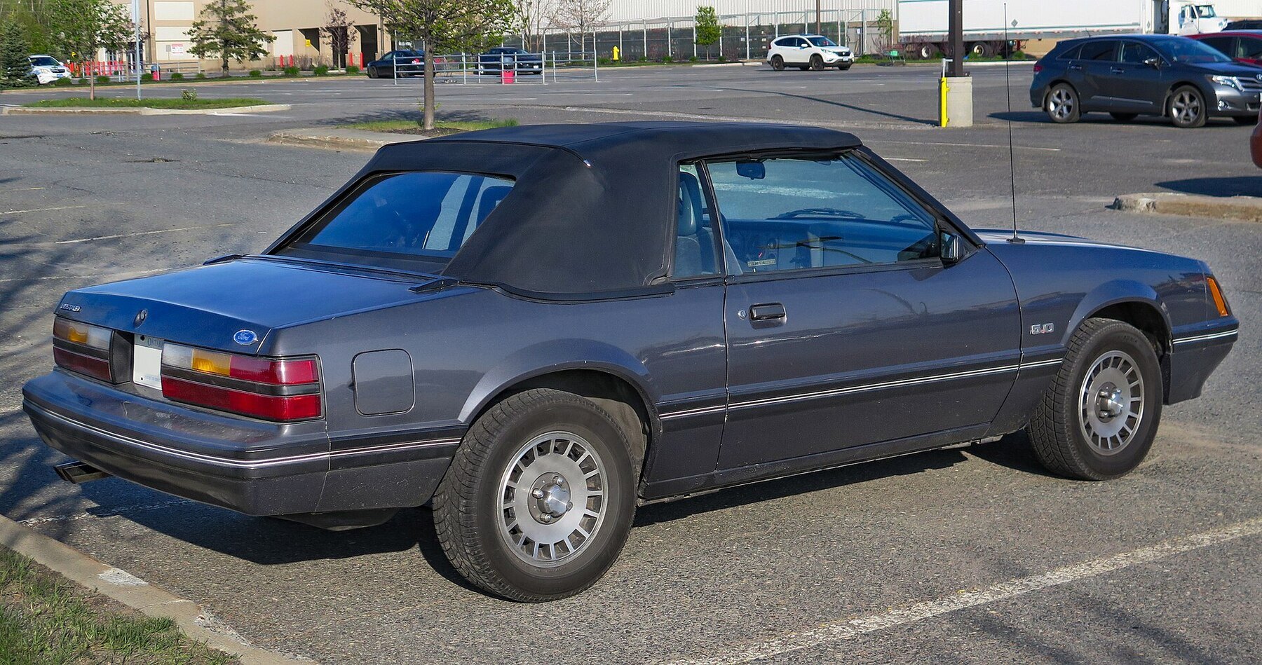 1984 Ford Mustang GT 5.0 Convertible in Dark Charcoal Metallic, Rear Right, 05-21-2023