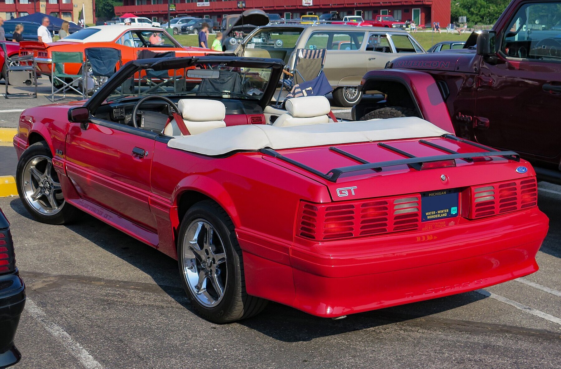 1991 Ford Mustang GT Convertible in Bright Red, Rear Left (St. Ignace 2023)